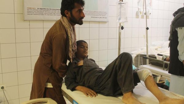 An Afghan resident is treated at a hospital following an air strike in Kunduz on April 2, 2018. (AFP)