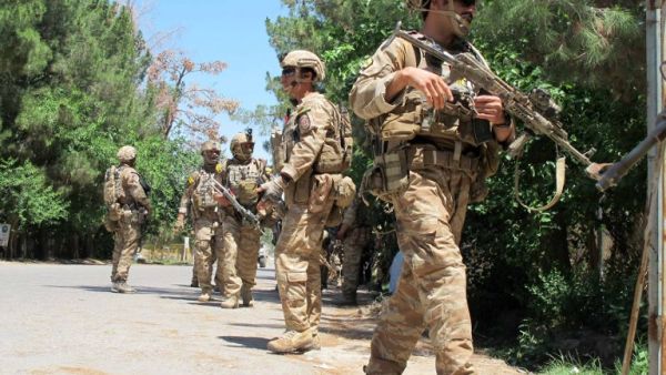 Afghan soldiers on patrol in Helmand province. (AFP/File) Afghan soldiers on patrol in Helmand province. (AFP/File)