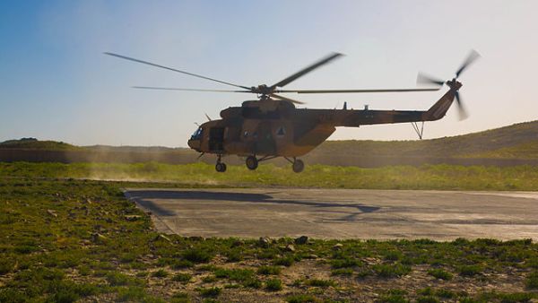 An Afghan National Army rescue helicopter lands at Combat Outpost Lily, Paktika province, Afghanistan, May 20, 2013 (Wikimedia)