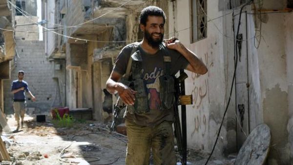 An Ahrar al-Sham fighter in Damascus. Ahrar al-Sham is one of many rebel groups to use "sham" in their name. (AFP/File)