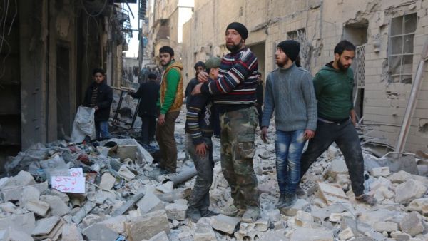 Damage from a February 2016 airstrike in Aleppo, Syria (AFP/Thaer Mohammed)