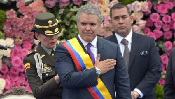 Colombia's new President Ivan Duque gestures after receiving the presidential sash during his inauguration ceremony at Bolivar Square in Bogota, on August 7, 2018. (Raul Arboleda / AFP)