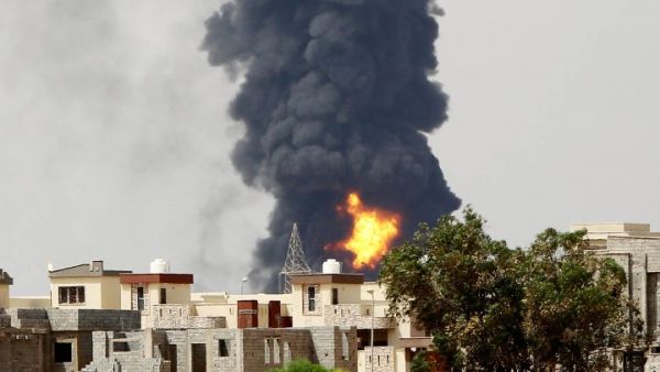 Column of smoke billowing over Tripoli.. (AFP/File)