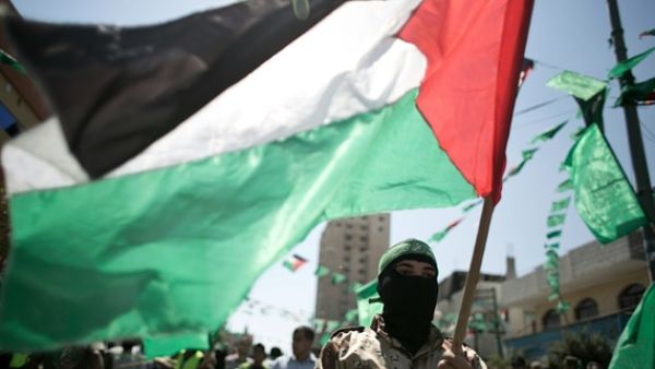 A Palestinian militant and Hamas supporter takes part in an anti-Israeli protest in the southern Gaza Strip town of Khan Yunis in September 2015. (AFP/Said Khatib)
