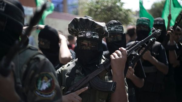 Palestinian Hamas militants take part in a 2015 anti-Israeli protest in the southern Gaza Strip town of Khan Yunis. (AFP/Said Khatib)