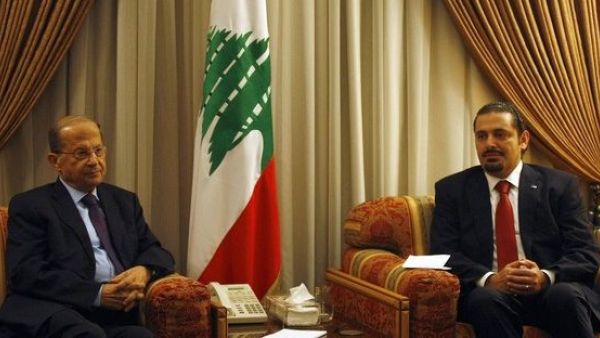 Lebanon's new president, Michel Aoun, and former prime minister, Saad al-Hariri. (AFP/File) 