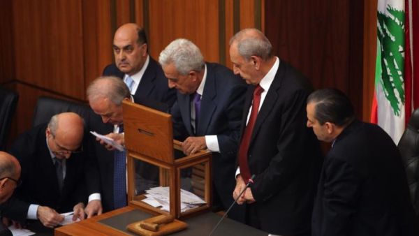 Lebanese members of parliament count the votes after casting their ballots to elect the new Lebanese president in the parliament building in downtown Beirut on April 23, 2014. (AFP/Joseph Eid) 