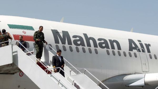 A Mahan Air plane pictured on the tarmac after landing at Sanaa International Airport in the Yemeni capital on March 1, 2015. (AFP Photo/Mohammed Huwais)