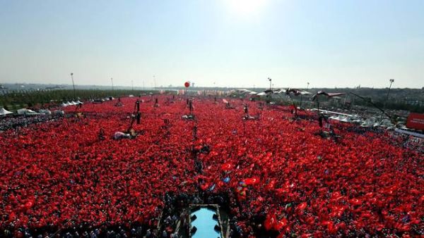People waving Turkish national flags as they gather on at Yenikapi in Istanbul during a rally against failed military coup on July 15.  (AFP/File) 