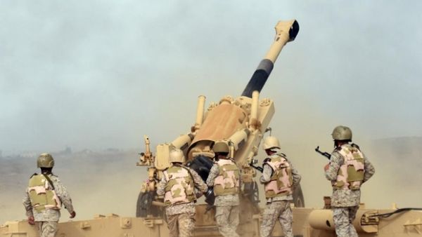 Saudi soldiers from an artillery unit fire shells from a post close to the Saudi-Yemeni border. (AFP/File)