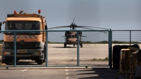 A photo taken on July 16, 2016 shows a Turkish military helicopter at Alexandroupolis airport, after landing there carrying eight officers seeking asylum after a failed coup in Turkey the night before. (AFP/Sakis Mitrolidis)