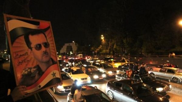مسيرة مؤيدة للرئيس السوري بشار الأسد.