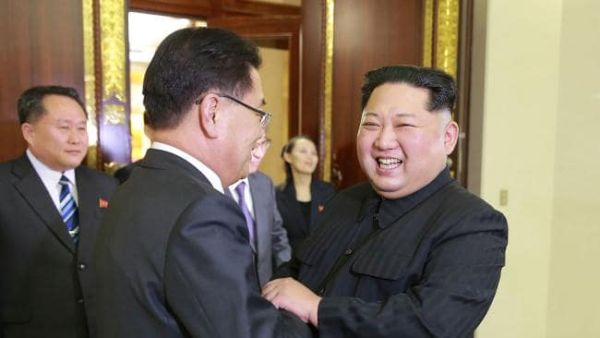 Kim Jong-un shakes hands with South Korean chief delegator Chung Eui-yong during their meeting in North Korea. (AFP/ Photo)