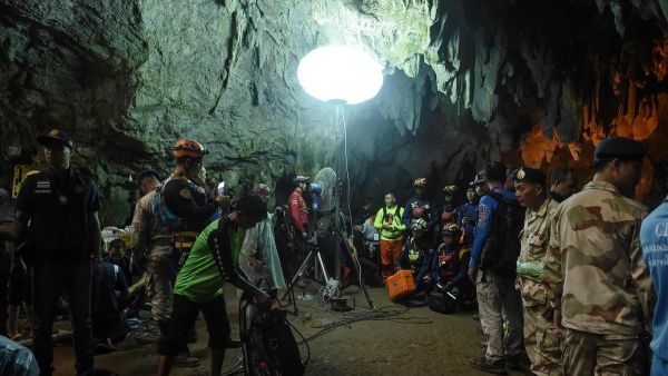 Thai rescue personnel at the entrance of Tham Luang cave in Chiang Rai province. (AFP/ File Photo)