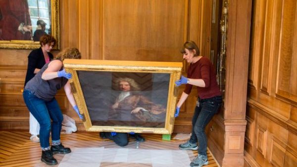 Cleo Lake removed a 300-year-old portrait of a slave trader from the wall above her desk (Twitter)