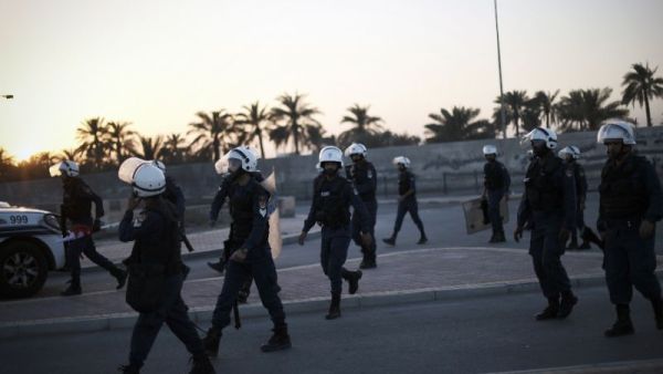 Bahraini forces raided homes in the capital Manama, arresting 10 citizens, amid ongoing protests against the government crackdown on political dissidents. (AFP/ File Photo)