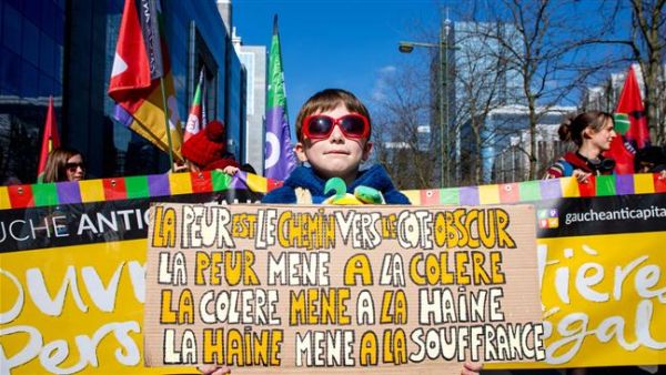 People take part in a national protest against racism, hatred, discrimination, inequality and aggression in Brussels, March 24, 2018. (AFP/ File Photo). 