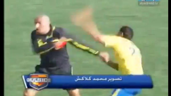 In Lebanon, a yellow card made footballers so red-faced, they gave a black eye to the now blue referee. 