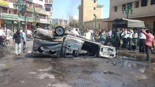 A truck is destroyed after protests by Pro Morsi followers face resistance from the Egyptian government.