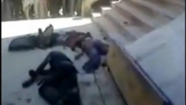 Bodies of the regime soldiers land on the floor