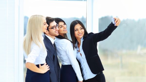 It is easy to form a bond with colleagues over the ruthless world of work. (Shutterstock)