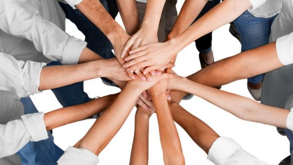 Working in a team improves personal communication skills and helps exchange of information. (Shutterstock)