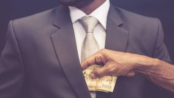 A third of people overall said they feared retaliation if they reported corruption. (Shutterstock)