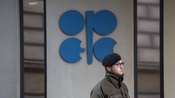 An Austrian soldier stands guard outside the OPEC headquarters on the eve of the 171th meeting of the Organization of the Petroleum Exporting Countries in Vienna. (AFP/Joe Klamar) 