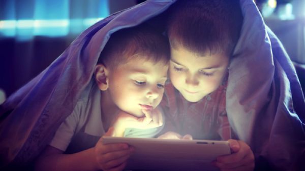 Too much time using digital media in the wrong way is linked to children's quality of sleep, child development and physical health. (Shutterstock)