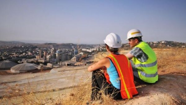Lafarge Holcim workers overlooking their cement plant in Jordan. (Lafarge Holcim)