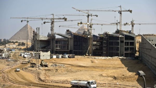 Egypt's currency devaluation has increased costs for the construction industry, negatively impacting developers’ cash flows.  (AFP/File)