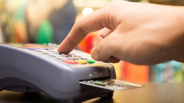 The average person in the UAE owes $11,590 in debt, often the form of credit card balances and car loans. (Shutterstock)