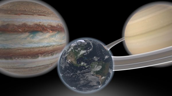 This artist's concept shows a hypothetical Earth-like planet and two giant 'neighbors'. (Credit: NASA/JPL-Caltech)
