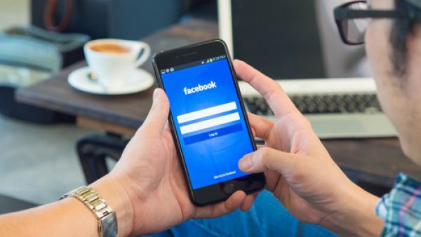 Facebook will allow users reporting a broadcast on “Facebook Live” to contact a friend or to call an emergency line.  (Shutterstock/Viewvie)
