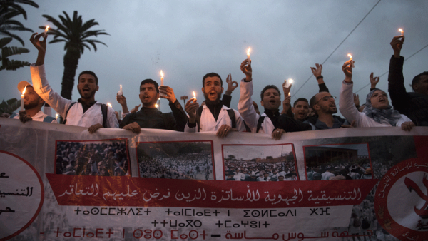 The teachers on temporary contracts, who have been on strike since March 3, enjoy the same salaries as their permanent colleagues - 5,000 dirhams ($520) a month. (AFP)