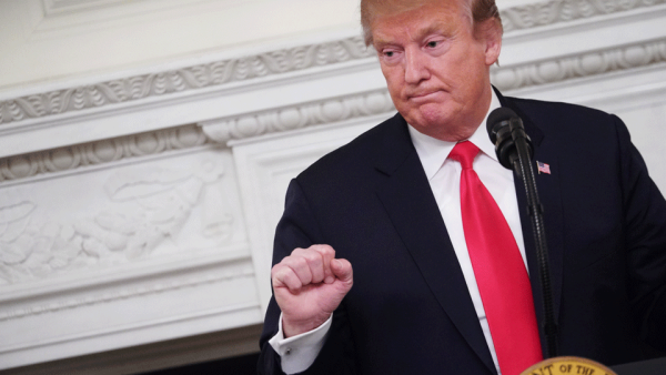 US President Donald Trump addresses the National Association of Attorneys General in the State Dining Room of the White House in Washington, DC on March 4, 2019. (AFP)