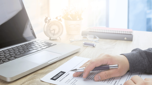 If you truly want to stand out all other candidates, you’ll need to put on your detective hat on and search high, low and everywhere in between and find out all that you can about a company before attending an interview. (Shutterstock)