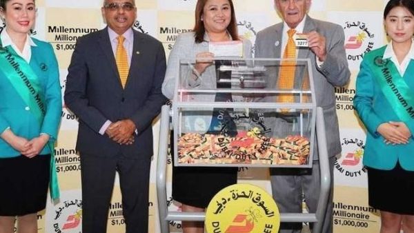 Officials at Dubai Duty Free supervise the latest draw for its millionaire promotion. (KhT)