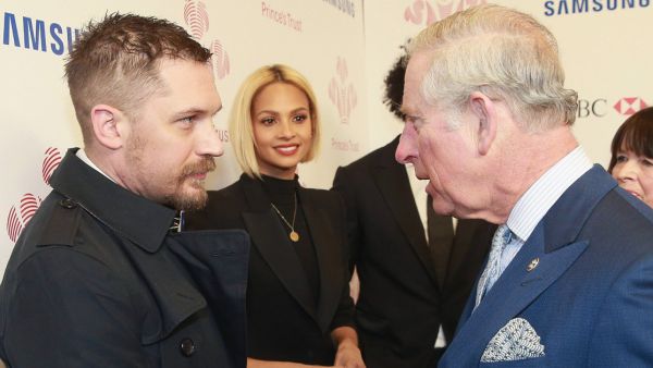 Tom Hardy beams with pride as he receives CBE for his services to drama from Prince Charles at Buckingham Palace (Twitter)