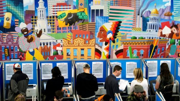 Voters cast their ballots in Denver, Colorado (AFP/Jason Connolly) 