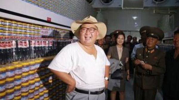 Kim Jong Un visits fish pickling plant (Twitter)