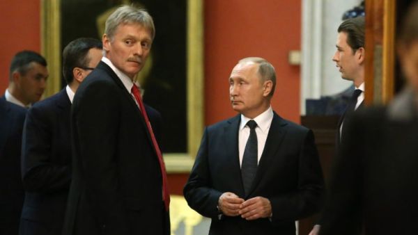 Dmitry Peskov (left), a spokesperson for President Vladimir Putin (Twitter)