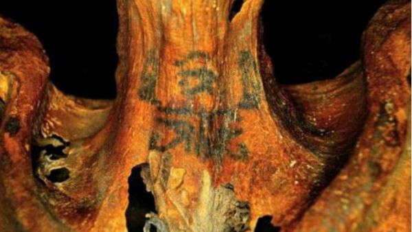 Woman with ancient tattoos (Twitter)