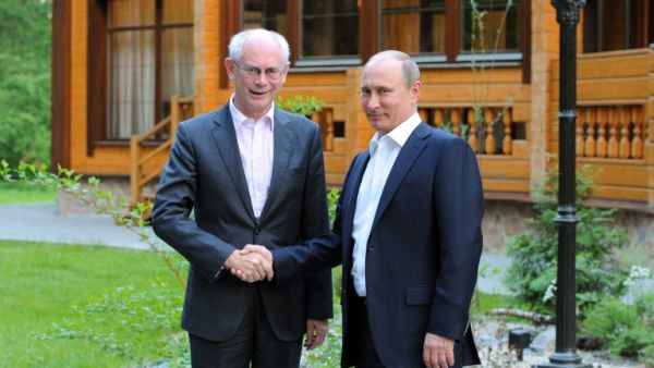 Russia's President Vladimir Putin shakes hands with EU President Herman Van Rompuy (Mikhail Klimentyev/ AFP)