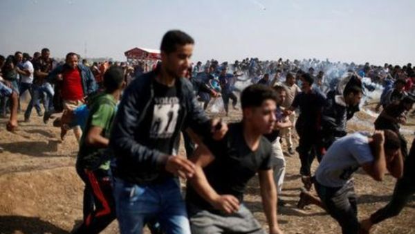 شهيد ومئات الجرحى برصاص الجيش الاسرائيلي على حدود غزة