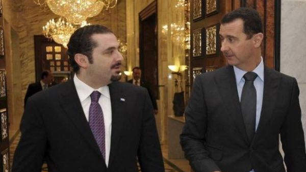 الرئيس السوري بشار الاسد مستقبلا سعد الحريري خلال احدى زياراته الى دمشق