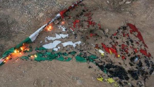 علم كردي محروق في كركوك
