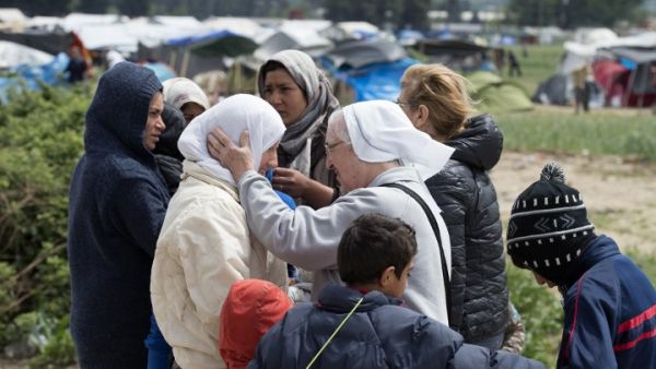 A nun talks to a woman at a makeshift camp for migrants and refugees near the village of Idomeni not far from the Greek-Macedonian border on May 4, 2016. (AFP/Tobias Schwarz) A nun talks to a woman at a makeshift camp for migrants and refugees near the village of Idomeni not far from the Greek-Macedonian border on May 4, 2016. (AFP/Tobias Schwarz)