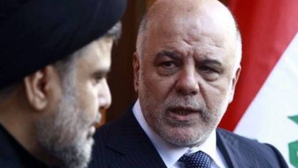 رئيس الوزراء العراقي حيدر العبادي والزعيم الشيعي مقتدى الصدر