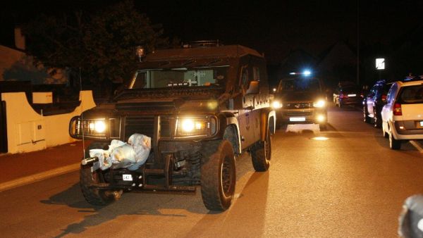 A French special forces RAID vehicle leaves after an assault on June 14, 2016 in Magnanville, 45 kms west of Paris following a police operation late Monday, hours after a man had stabbed a police officer to death. (AFP/Matthieu Alexandre)
